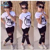 Toptan-2016 Yeni Moda Çocuk Kız Giysileri Set Küçük Kız Yaz Kısa Kollu T-Shirt Ve Delik Pantolon Tayt 2 adet Kıyafet Çocuk Seti