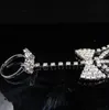 Gioielli da sposa Braccialetti con anelli da dito da sposa Cravatta con strass Bracciale da sposa con imbracatura Bracciali con catena alla schiava Braccialetti con mani da sposa