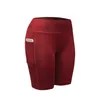 Partihandel-2017 Snabbtork Kvinnor Sport Shorts Kvinnor Elastisk Running Fitness Gym Shorts med Pocket Feminino Fitness Workout Shorts