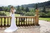 Öppna rygg bröllopsklänningar Lång vit klänning spetsar från axel hals rygglös långärmad räkning tåg charmig design mantel stil top9846793