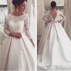 Modest Wedding Dress Illusion Sleeves Sheer Bateau Neck Lace Appliqued Top Backless Wedding Dresses Modern Bridal Gowns with Bead Sash