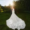 Lace Mermaid Bröllopsklänningar Spaghetti Band Trumpet Appliqued Bridal Gowns Court Train Tulle Country Wedding Dress