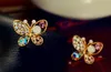ファッション結婚式のイヤリングカラフルな水晶中空の蝶のスタッドイヤリングゴールドメッキの合金イヤリングスタッド女子族耳ジュエリー