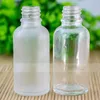 Clear en Frosted Essential Oil Glass Bottle 30ml druppelaar container met veilige kindvrije deksels