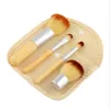 Pinceaux de maquillage en bois portables Ensemble de pinceaux cosmétiques élaborés en bambou Kit de pinceaux Kabuki pour femme Pinceau de maquillage avec sac à boutons 4pcs / set OOA2155