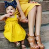 vestidos de amarillo niños niñas