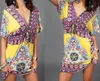 女性のファッションプラスサイズのドレスセクシーなVネックミルクアイスシルクドレススカートボホプリント部族のドレス夏の民族のゆるいウエストのビーチドレス