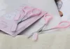 Totalmente novo venda 50pcs feminino cor rosa tesoura de sobrancelha com pentes ferramentas de maquiagem 8296209