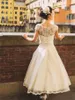 2017 Vintage Avorio Pizzo Lunghezza tè Abiti da sposa economici Manica corta Bottoni ricoperti sul retro Abiti da sposa Plus Size Custom Made EN5112