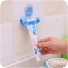 Groothandel - 5 kleuren plastic rollende buis squeezer nuttige tandpasta Easy dispenser, badkamer tandpasta houder, badkamer accessoires