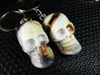free shipping yqtdmy 12 pcs gothic boy's fashion gift cool devil skull head biker keychain