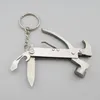 Multi-Function Hammer Tool med Plier Keyring Hammer, Claw Pince, Plier, Nail Puller, Kniv, Flasköppnare, Pocket Miniatyr Telefon Nyckelring