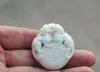 Handmade, double-sided carving, natural white jade brave (blessing). Necklace pendant