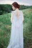 Romantisches Feen-Hochzeitskleid, A-Linie, Bohemian-Brautkleid mit offenem Rücken, durchsichtiger Bateau-Perlenausschnitt, fließende Schleppe, Vintage-Strandhochzeitskleid