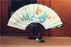 Kinesisk konst och hantverk tv-fans till himlen Kingdom / evig kärlek) Rice Paper Wood Foldings Kunlun Handmålade Forntida Props Folding Fan