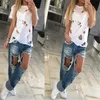 Trous d'été T-shirt femmes mode Sexy noir blanc coton à manches courtes déchiré hauts chemises décontracté T-shirt ample XS-L