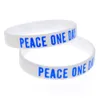 100PCS 21 de septiembre Peace One Day Pulsera de caucho de silicona Logotipo impreso Tamaño adulto blanco para regalo promocional