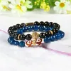 Topkwaliteit sieraden Groothandel 8mm Facet Blue and Black Agate Steen Kralen met Pvd Plated Lion Head Armbanden voor Mannen