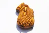 Porte-monnaie amulette oeil de tigre naturel type animal sauvage mythique. Collier pendentif
