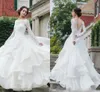 Kapel jurk tuin ruches bruidsjurk lange mouw elegante backless sexy tiered rok goedkope prijs hoge kwaliteit bateau nekvloer lengte