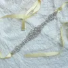 花嫁のブライダルドレスベルトラインストーンクリスタルリボンのためのウェディングサッシから、PROM手作りの白赤黒ブラシシルバーの実際のイメージ
