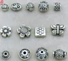 100pcs tibetansk silverfat spacer charms fynd Bohemian retro antika lösa pärlor mix stilar smycken tillbehör grossist