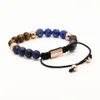 Billiga Smycken Partihandel 10st / Parti 8mm Blue Sea Sediment Stenpärlor Med En Grad Tiger Eye Stone Energy Macrame Armband