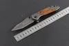 Commercio all'ingrosso Browning X66 2 modelli titanio coltello pieghevole tattico Flipper manico in legno campeggio esterno caccia sopravvivenza coltello da tasca strumento EDC