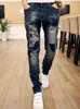 Vente en gros - Haute Qualité 2017 Mode Ripped Patch Jeans Hommes Vintage Designer Crayon Pantalon Effet Moustache Hip Hop Pantalons Occasionnels