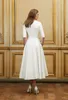 2016 Colección Short Beach vestidos de novia con medias mangas Delphine Manivet una línea Sexy Deep V cuello Vintage Tea Length Bride Dress