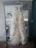 Högkvalitativ riktig bild hög lågt bröllopsklänning lyxfjäder brudklänningar pärlor paljetter kristaller spets topp handgjorda blommor dragkedja tillbaka
