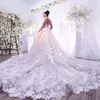 Charmante mini-col haut Dubaï robes de mariée perlées appliques florales manches longues robes de mariée en organza robe de mariée glamour train chapelle