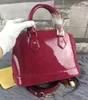 Designer Bag Shell Alma BB Handbag Luxury Shinny Leather Crossbody Bag Lady Patent Purse Tote Colourfull Women Classic Zipper Pocket Sac En huvudsaklig Dicky Messenger -väska