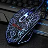 Tastiera da gioco cablata USB di nuova marca Tastiera retroilluminata ergonomica e gioco Regolabile 2400 DPI Mouse Cracking Illuminazione retroilluminata 3 colori