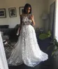 Graciös vit en linje brudklänningar sexig se genom handgjorda applikationer Sheer back bröllopsklänningar South African Sweep Train Wedding Vestidos