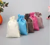 Sacs à cordon en tissu de lin bijoux de bonbons pochettes cadeaux sacs d'emballage sacs de jute cadeau sac d'alimentation mobile sac d'emballage en toile de jute multi couleur