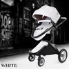 Cochecito de bebé de cuero PU de moda, carrito de bebé plegable multifunción, cochecito de 4 ruedas con asiento Reversible