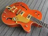 Nashville Eddie Cochran Brian Setzer Jazz Orange Chitarra elettrica Top in acero fiammato, corpo semi cavo, ponte Bigs Tremolo, hardware dorato