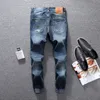 Donkerblauwe kleur mode heren jeans topkwaliteit enkel banded vernietigd gescheurde jeans denim broek merk klassieke jogger mannen