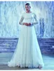 Hot A-Line Lace Tulle Skromne suknie ślubne z długimi rękawami Przyciski z powrotem o Neck Country Lds Suknie ślubne z pełnymi rękawami