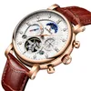 Kinyued gloednieuwe horloge Zwitsers automatisch mode lederen insert diamant ster heren holle mechanisch horloge219n