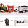 طراز لعبة السكك الحديدية السكك الحديدية التحكم عن بعد RC Track Car Electric Steam Smoke RC Christmas Train Set Gift