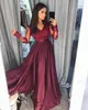 Robes de bal fendues de raisin profond Robe de soirée sexy à col en V en dentelle appliquée à manches longues Robes de soirée élégantes en Arabie Saoudite Robe de soirée trapèze 2018 Robe de bal