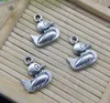 En gros 100pcs petit canard alliage pendentif à breloques rétro fabrication de bijoux bricolage porte-clés ancien pendentif en argent pour bracelet boucles d'oreilles 19 * 11mm