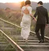 2018 Vestidos De Casamento Da Sereia Do Laço Do Vintage Meia Manga Com Decote Em V Botão Coberto Nua Traseira Do Tribunal Trem Boho Vestidos De Noiva País Vestidos de Casamento