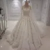 Lange Ärmel Spitze Brautkleider Sexy Juwelenhals Perlenapplikationen Ballkleid Brautkleid Glamouröse lange Brautkleider aus Saudi-Arabien Tüll