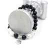 Bracciale Mala con perline di preghiera e meditazione con ciondolo a forma di Buddha buddista in pietra di onice nero naturale bianco howlite da 8 mm