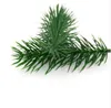 Cheap 50pcs piante artificiali rami di pino albero di Natale decorazione di nozze fai da te artigianato accessori per bambini regalo bouquet