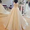 Wedding Gowns A-Line V Neck Lace Top Satin Skirt Backless Wedding Dresses with Bow Sash and Court Train