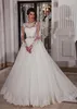 Long Sleeves Cheap Wedding Dresses Ivory Dubai African Bridal Gowns With Jewel Neck Covered Button Crystal Belt Sweep Train